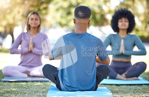 Image of Mediation, fitness and yoga class with people in park for relax, mindfulness and spirituality. Zen, peace and wellness with group and training in grass field for health, healing or gratitude