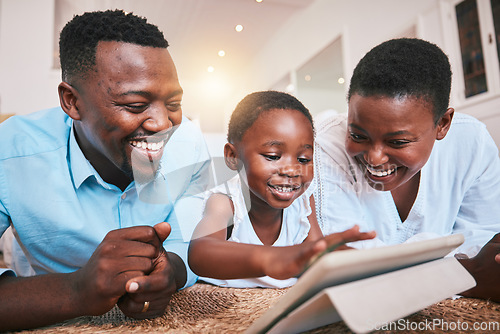 Image of Digital happy and tablet with black family in living room for streaming, online games and elearning app. Relax, technology and internet with parents and child at home for movies, education or network