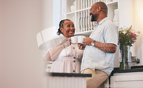 Image of Coffee, happy and a talking black couple in the kitchen, laughing and relax in the morning. Smile, love and an elderly African man and woman speaking with a tea drink and conversation in a house