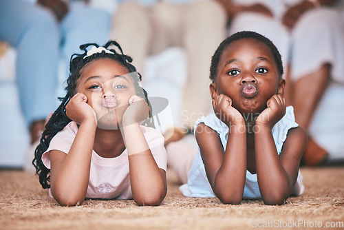 Image of Relax, girls or portrait of children on the floor, carpet or mat bonding or playing in family home together. Kiss, kids or young African girl siblings resting, playing or enjoying weekend or holiday