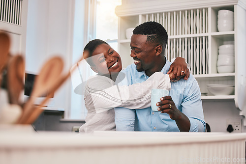 Image of Coffee, hug or happy black couple in kitchen talking or laughing to relax with love or care at home. Smile, morning or African man speaking to woman with tea drink bonding in conversation together