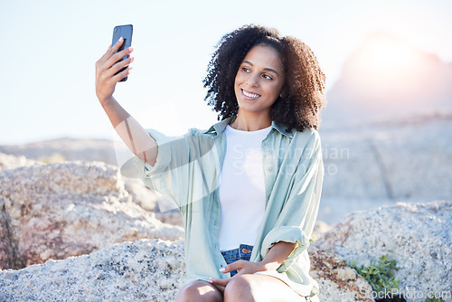 Image of Woman, smile and selfie at beach on travel blog, social media post or memory of summer vacation. Happy female influencer, photography or gen z content creator on holiday, freedom or sunshine at ocean