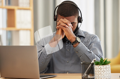 Image of Call center, stress and business man praying, stress and fatigue for communication mistake or sales fail on laptop. Agent, consultant or person with depression, tired and faith or hope for e commerce