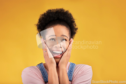 Image of Thinking, surprise and woman with a smile, excited and expression on a yellow studio background. Female person, happiness and African model with shock, emoji and omg with good news, winning and wow