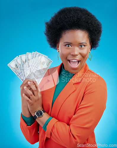 Image of Money, wow and business woman in portrait for winning, cash and lottery fan on blue background. Surprise face, bonus and rich african person or winner for profit, cashback or financial loan in studio