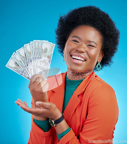 Image of Money, offer and business woman in portrait for winning, cash and lottery fan on blue background. Face, investment and rich african person or winner with bonus, cashback and financial loan in studio