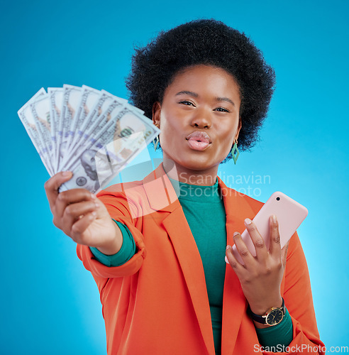 Image of Money, phone and woman in portrait winning, finance or online savings, profit or cash prize. Success, lottery and winner or african person on mobile, cashback fan or banking on blue studio background