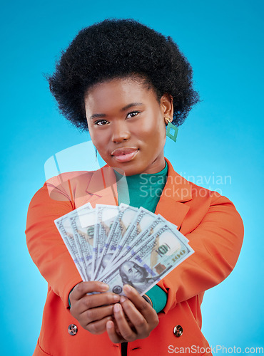 Image of Money, fan and business woman in portrait for winning, cash and lottery offer on blue background. Face, investment and rich african person or winner with bonus, cashback and financial loan in studio