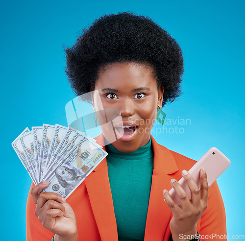 Image of African woman, cash and phone in studio portrait with wow, surprise and happy for profit by blue background. Black gen z girl, smartphone and money with shock, winner and gambling app for giveaway