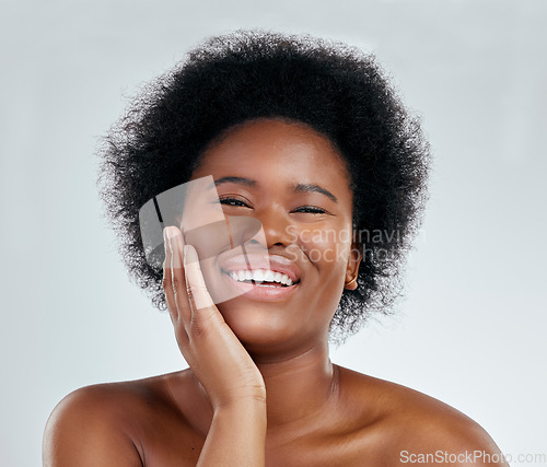 Image of Happy black woman, portrait and afro in skincare, natural beauty or cosmetics against a white studio background. Face of excited African female person smile for perfect skin, spa or facial treatment