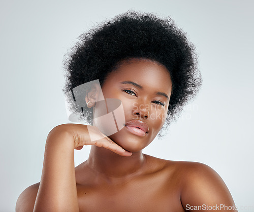 Image of Face, beauty and skincare of black woman with confidence in studio isolated on a white background. Portrait, serious and natural model with cosmetic, facial treatment or aesthetic, wellness or health
