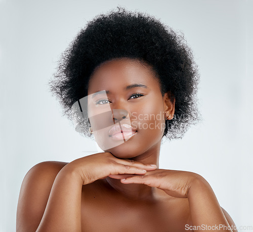 Image of Beauty, face and skincare of black woman with hands in studio isolated on a white background. Portrait, serious and natural model with cosmetics, spa facial treatment or aesthetic, wellness or health