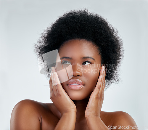 Image of Self care, beauty and African woman in a studio with a natural, wellness or cosmetic face routine. Health, young and headshot of a female model with facial dermatology treatment by a gray background.