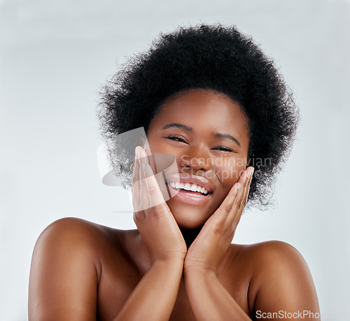 Image of Skincare, beauty and portrait of a woman in studio with a natural, wellness or cosmetic face routine. Health, young and headshot of an African female model with facial dermatology by gray background.