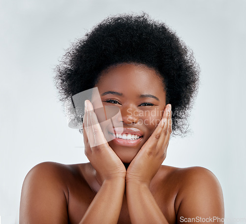 Image of Wellness, beauty and portrait of a woman in studio with a natural, skincare or cosmetic face routine. Health, young and headshot of an African female model with facial dermatology by gray background.