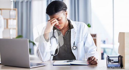 Image of Headache, tired doctor and woman in medical office with burnout challenge, clinic problem and stress risk. Frustrated black female healthcare worker with fatigue, migraine pain and anxiety of mistake