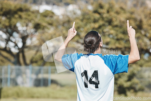 Image of Back, success and a man with a gesture for soccer, game win and celebration of a goal. Happy, field and a football player or athlete excited about a sports achievement, competition or motivation