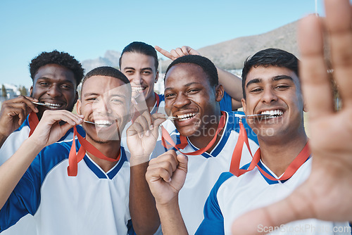 Image of Men in selfie, medal and winner, soccer competition and sports, athlete group on field, diversity and success. Portrait, young male football player and team with smile in picture, winning and prize