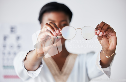 Image of Hands, woman and optician with glasses for vision, eyesight and eye care prescription lens. Closeup of doctor, optometrist and frame for eyewear, test and consulting for optical assessment in clinic