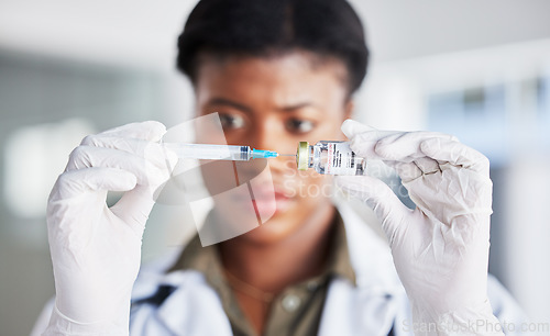 Image of Vaccine bottle, needle and doctor for safety, healthcare and smallpox medicine. Closeup, hands of woman and prepare vaccination, virus injection and vial for immunity, medical drugs or liquid product