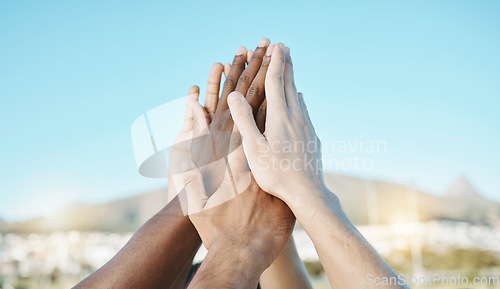 Image of Success, high five or hands of team on field ready for training, practice or sports game outdoors. Fitness, inspiration or people with motivation on soccer field together in support or solidarity