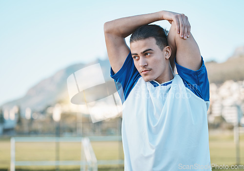 Image of Thinking, man or soccer player stretching arms on football field in training, exercise or workout in Brazil. Fitness, warm up or male athlete ready to start practice match or sports game in stadium