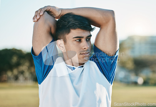 Image of Man, soccer field or football player stretching arms thinking of training, exercise or workout in Brazil. Fitness, warm up or male athlete ready to start practice match or sports game in stadium