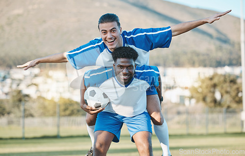 Image of Soccer player, support or team in celebration for goal, victory or success on a field in sports game together. Black man, piggyback or excited football players winning a fitness match achievement