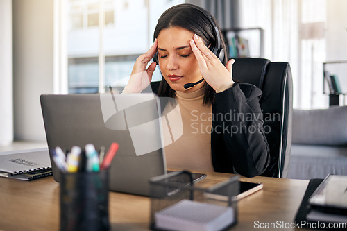 Image of Woman, call center and headache in stress, mistake or client problem on laptop at office desk. Frustrated female person, consultant or agent with bad head pain, anxiety or burnout at the workplace