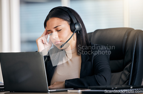 Image of Tired woman, call center and headache in stress, mistake or client problem on laptop at office desk. Frustrated female person or consultant agent in bad head pain, anxiety or burnout at the workplace