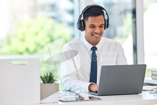 Image of Businessman, laptop and typing email with headphones in communication, networking or listening to music at office. Happy man, accountant or financial advisor working on computer for business proposal