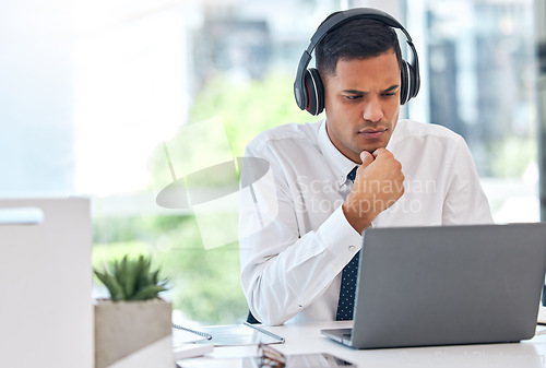 Image of Businessman, laptop and thinking for decision, choice or listening to music at office desk. Man, accountant or financial advisor in wonder working on computer for business plan, proposal or ideas