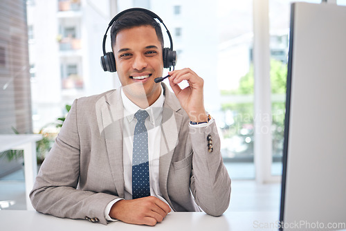 Image of Happy man, portrait and call center with headphones in customer service, support or telemarketing at office. Male person, consultant or agent smile for online advice, help or contact us at workplace