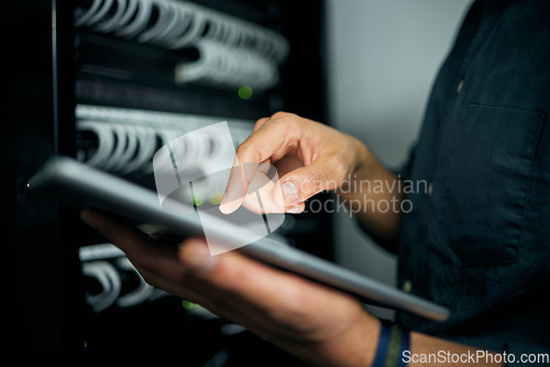 Image of Hands, tablet and typing in server room, man and inspection with coding, analysis and night for programming. Information technology expert, click and closeup for database, solution and it maintenance