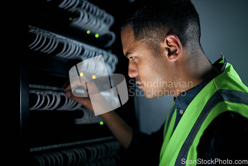 Image of Technician man, server room and inspection for cables, thinking and focus for analysis, night and programming. Information technology engineer, maintenance and database with problem solving mindset