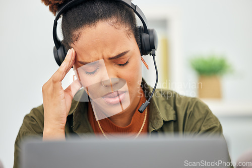 Image of Stress, call center and headache of woman at laptop in customer service agency with pain, burnout or anxiety. Face, frustrated and tired black female consultant in challenge of client account problem