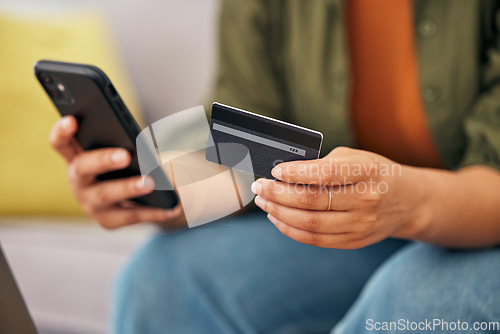 Image of Hands of woman, credit card and online shopping on smartphone in home for digital payment, fintech account and money. Closeup, mobile banking app and budget of cash, web sales and financial password