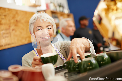 Image of Great coffee made by great people. Shot of a senior couple running a small business together.