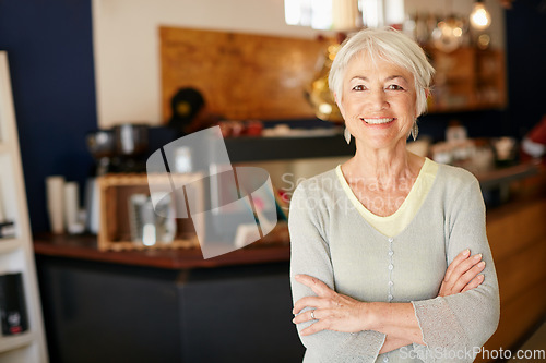 Image of Elderly, woman and portrait with crossed arms work in coffee shop for retirement for a small business. Senior female, professional and cafe for investment is working in a store for with a smile.