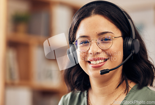 Image of Customer service, call center and portrait of a woman in the office with a headset working on an online consultation. Happy, smile and professional female telemarketing consultant in the workplace.