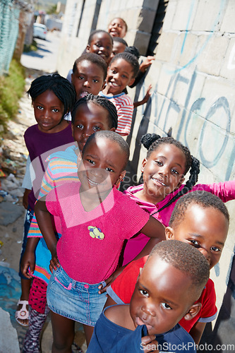 Image of The faces of our future. Cropped portrait of a group of kids at a community outreach event.