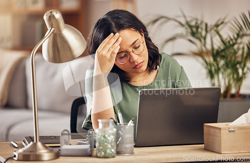 Image of Remote work from home, laptop and woman with a headache, stress and exhausted with health issue. Female person, freelancer or entrepreneur with a migraine, burnout and overworked with pain or fatigue