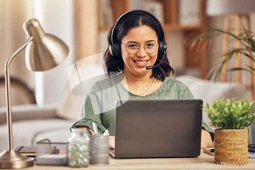 Image of Woman, portrait and smile in home office for call center job, headphones and mic for crm communication with laptop. Customer service, tech support and pc for remote work, help desk and telemarketing