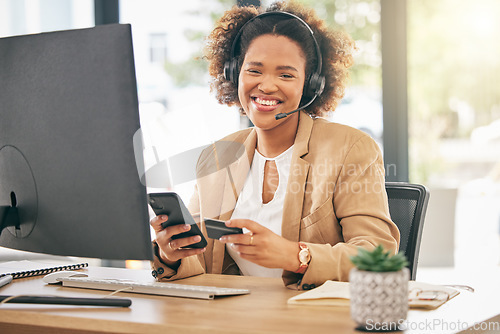 Image of Call center agent, portrait and woman with credit card for telemarketing, ecommerce and discount on smartphone in office. Happy African female consultant, sales trading and mobile for online banking