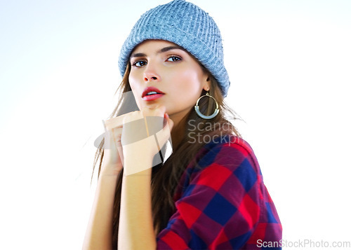 Image of Strong Always. Weak Never. Shot of a beautiful young woman posing with her fists up against a white background.