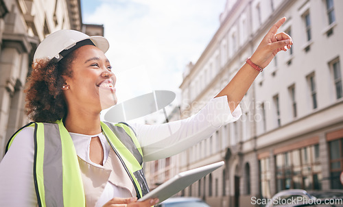 Image of Happy woman, architect and tablet pointing in city for construction, building or outdoor planning on site. Female person, engineer or contractor smile and technology for industrial urban architecture