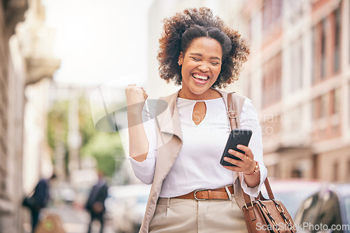 Image of Happy woman, phone and city in celebration for winning, bonus promotion or outdoor sale discount. Excited female person with fist pump in happiness on mobile smartphone for good news in an urban town