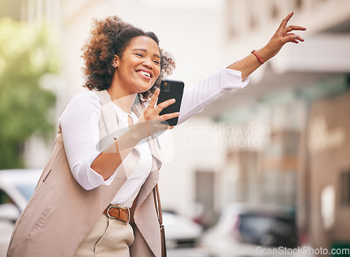 Image of Happy woman, phone and taxi in city for travel, waiting or transportation in street or outdoor road. Female person waving hand for ride service, lift or destination in urban town with smartphone app