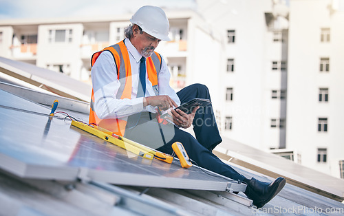 Image of Tablet, solar panels and engineering man in city, rooftop and urban development, sustainability or energy saving installation. Digital technology, inspection and electrician or person with power grid