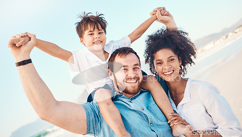 Image of Mother, father and a child happy at the beach while on a vacation, holiday or adventure. A woman, man and kid on shoulders while together outdoor for summer fun and travel with multiracial family